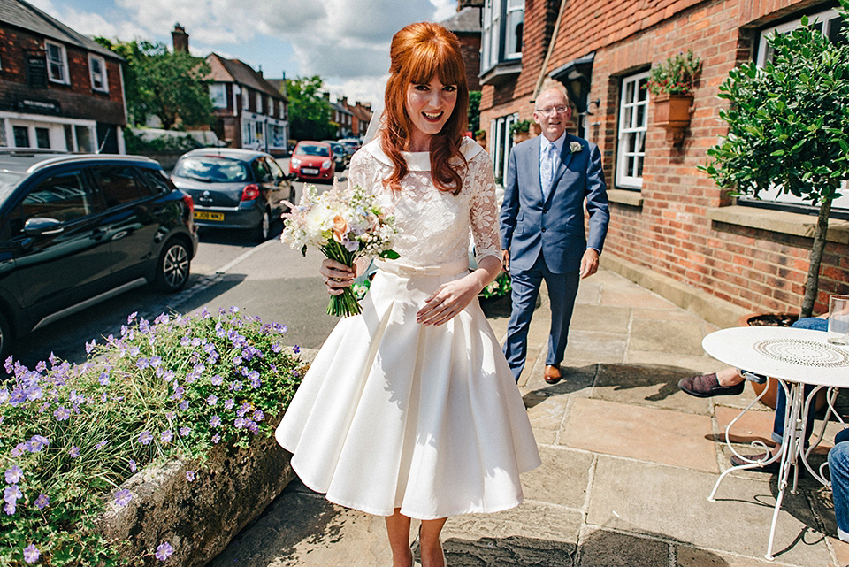 Bride Amy wears a replica 1960s wedding dress, designed by Fur Coat No Knickers of London, for her quirky and kitsch wedding. Photography by Jacqui McSweeney.