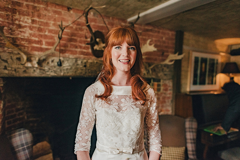 Bride Amy wears a replica 1960s wedding dress, designed by Fur Coat No Knickers of London, for her quirky and kitsch wedding. Photography by Jacqui McSweeney.