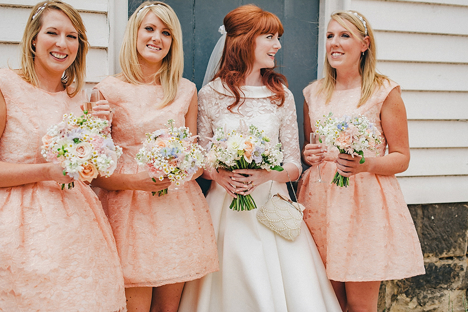 Bride Amy wears a replica 1960s wedding dress, designed by Fur Coat No Knickers of London, for her quirky and kitsch wedding. Photography by Jacqui McSweeney.