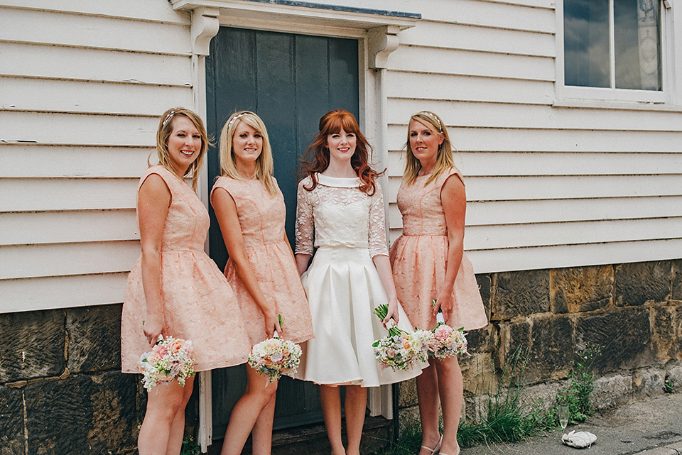 Bride Amy wears a replica 1960s wedding dress, designed by Fur Coat No Knickers of London, for her quirky and kitsch wedding. Photography by Jacqui McSweeney.