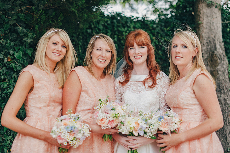 Bride Amy wears a replica 1960s wedding dress, designed by Fur Coat No Knickers of London, for her quirky and kitsch wedding. Photography by Jacqui McSweeney.