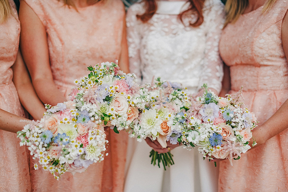 Bride Amy wears a replica 1960s wedding dress, designed by Fur Coat No Knickers of London, for her quirky and kitsch wedding. Photography by Jacqui McSweeney.