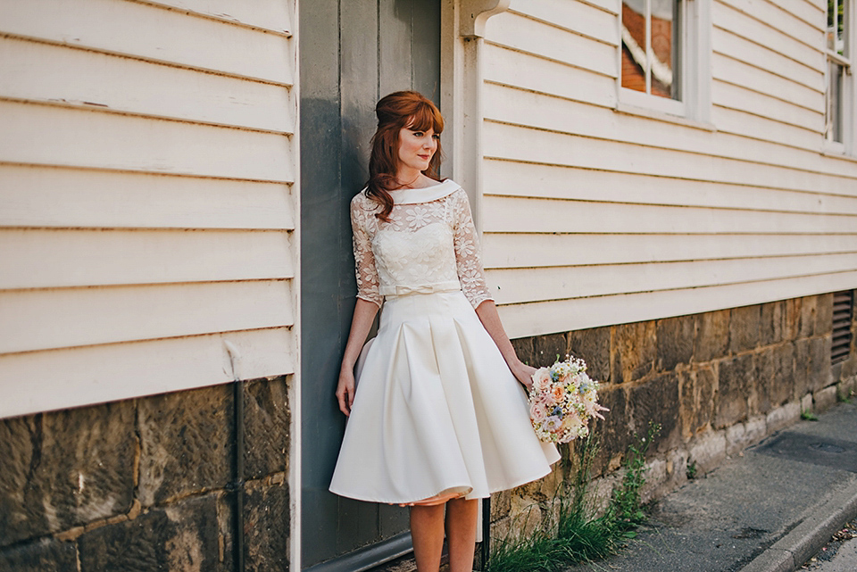 Bride Amy wears a replica 1960s wedding dress, designed by Fur Coat No Knickers of London, for her quirky and kitsch wedding. Photography by Jacqui McSweeney.