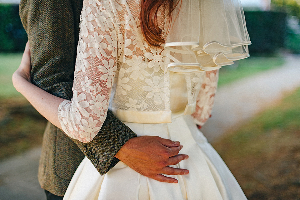 Bride Amy wears a replica 1960s wedding dress, designed by Fur Coat No Knickers of London, for her quirky and kitsch wedding. Photography by Jacqui McSweeney.