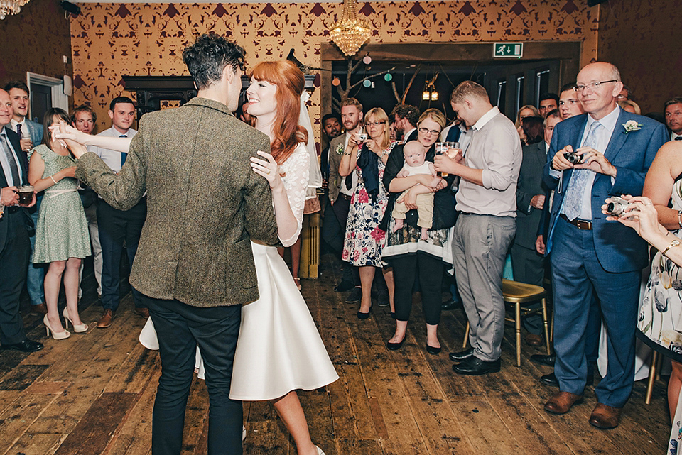 Bride Amy wears a replica 1960s wedding dress, designed by Fur Coat No Knickers of London, for her quirky and kitsch wedding. Photography by Jacqui McSweeney.