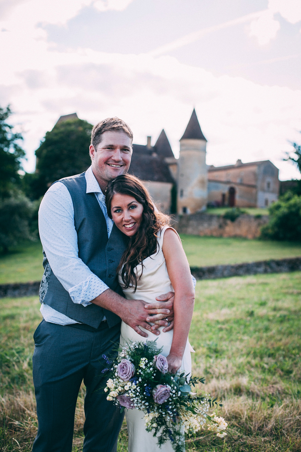 Bride Katie wears a David Fielden gown for her wedding in the Dordogne. Photography by Casey Avenue.