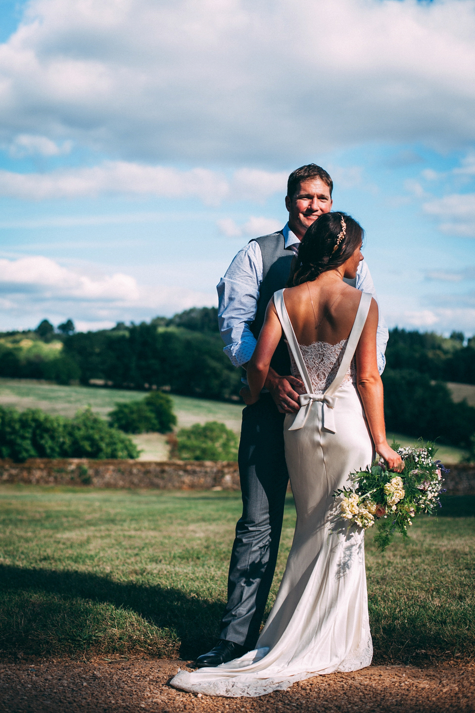 Bride Katie wears a David Fielden gown for her wedding in the Dordogne. Photography by Casey Avenue.