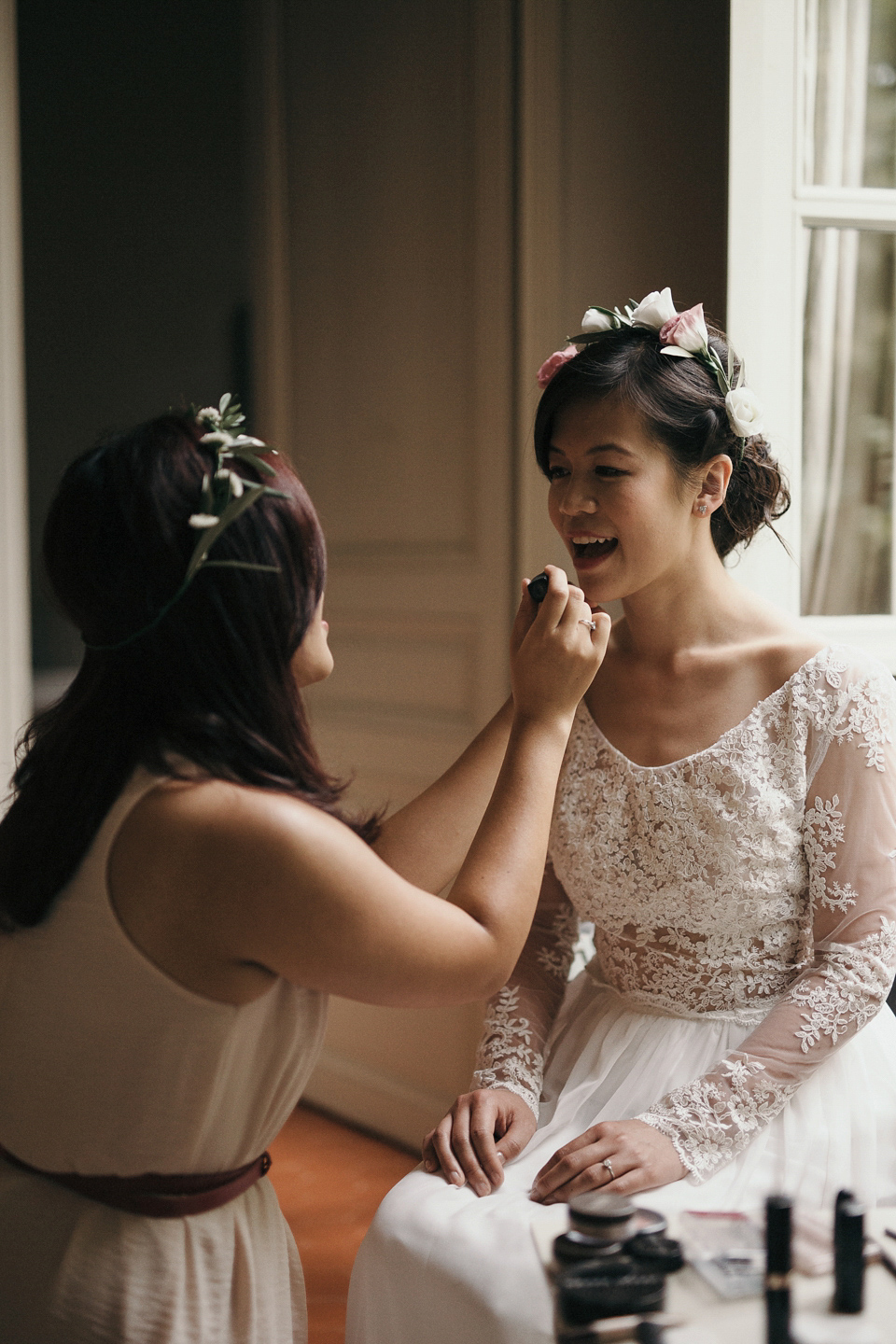 A first look and floral crown for an elegant and intimate chateau wedding in the South of France. Photography by Sabestien Boudot.