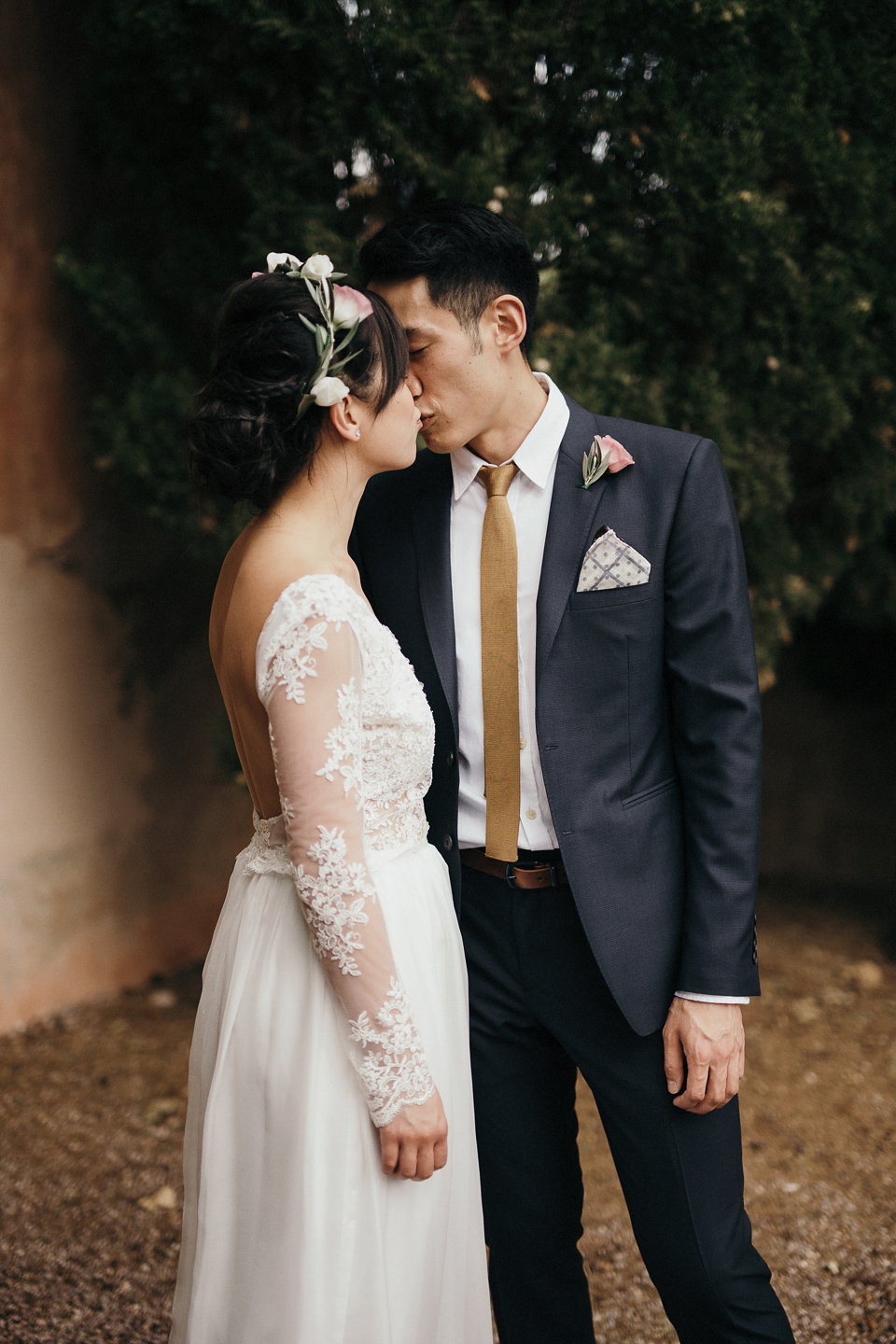 A first look and floral crown for an elegant and intimate chateau wedding in the South of France. Photography by Sabestien Boudot.