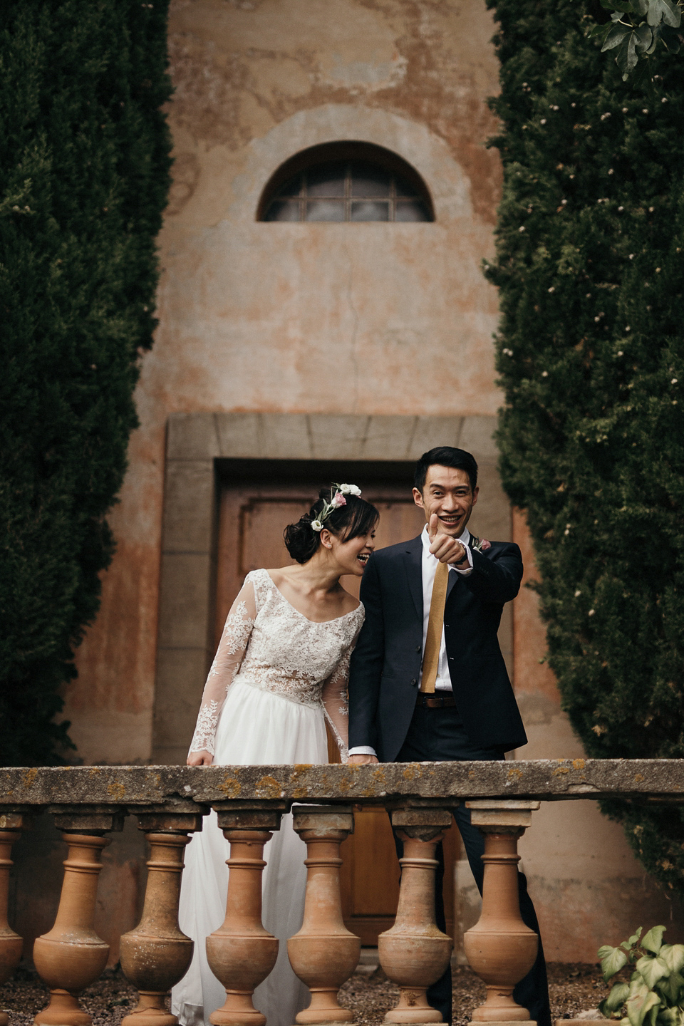 A first look and floral crown for an elegant and intimate chateau wedding in the South of France. Photography by Sabestien Boudot.