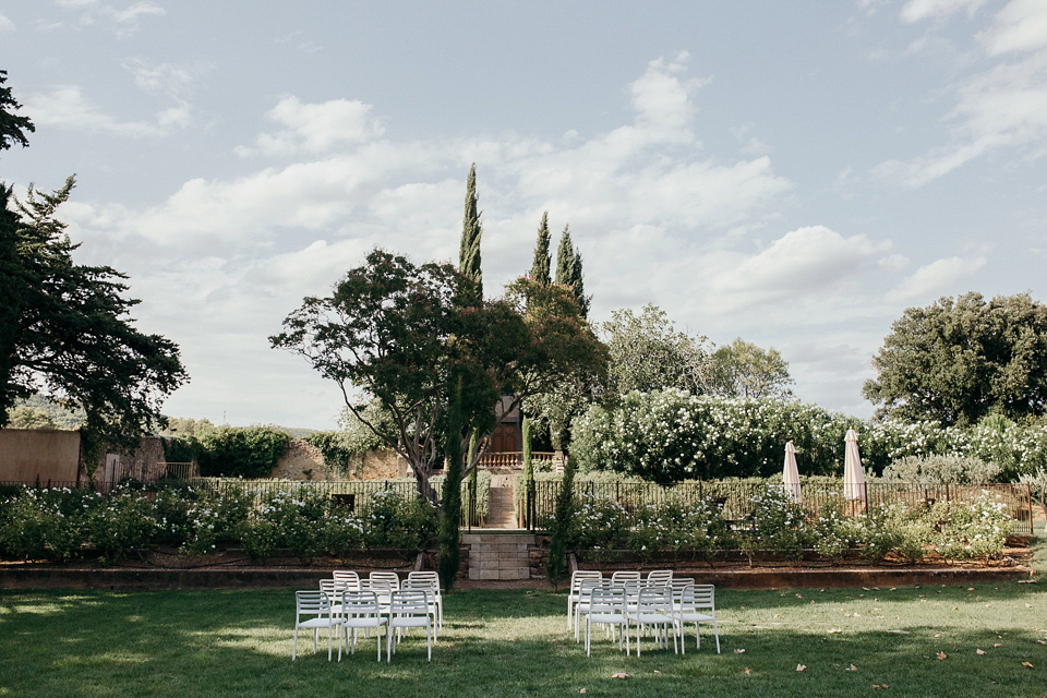 A first look and floral crown for an elegant and intimate chateau wedding in the South of France. Photography by Sabestien Boudot.