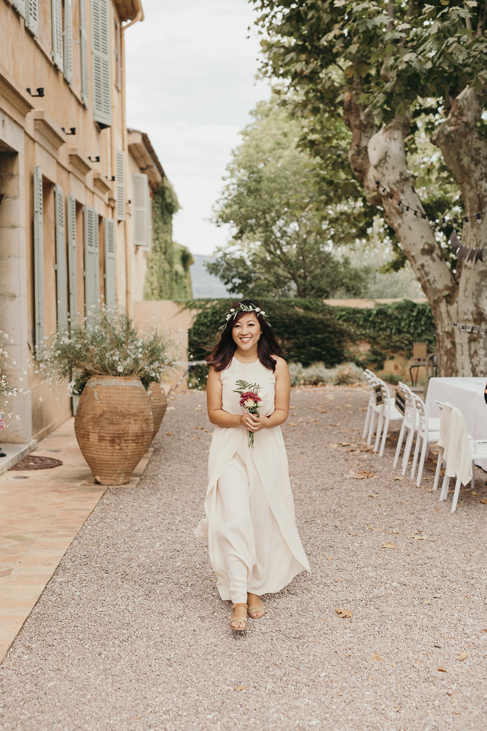 A first look and floral crown for an elegant and intimate chateau wedding in the South of France. Photography by Sabestien Boudot.