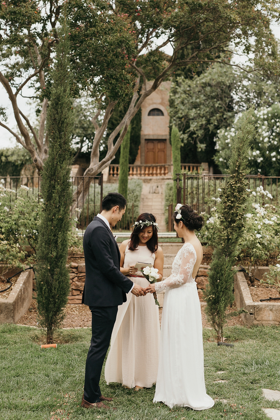 A first look and floral crown for an elegant and intimate chateau wedding in the South of France. Photography by Sabestien Boudot.