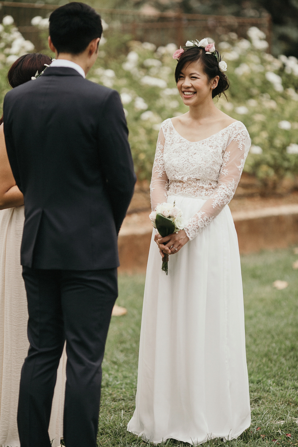 A first look and floral crown for an elegant and intimate chateau wedding in the South of France. Photography by Sabestien Boudot.