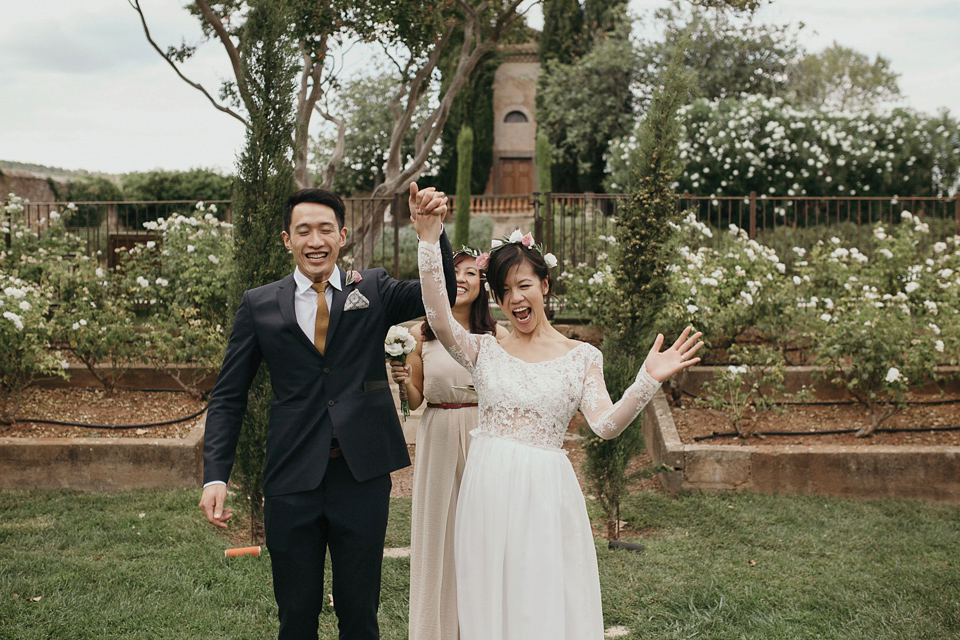 A first look and floral crown for an elegant and intimate chateau wedding in the South of France. Photography by Sabestien Boudot.