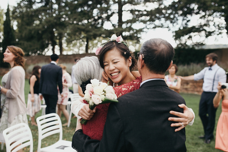 A first look and floral crown for an elegant and intimate chateau wedding in the South of France. Photography by Sabestien Boudot.