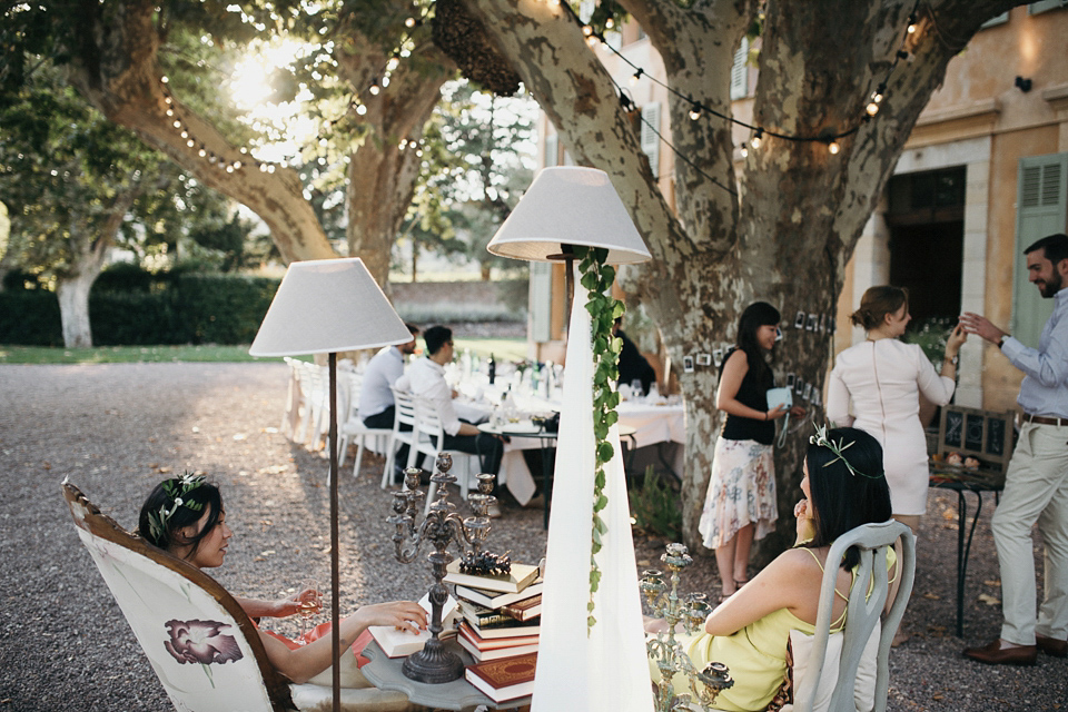 A first look and floral crown for an elegant and intimate chateau wedding in the South of France. Photography by Sabestien Boudot.