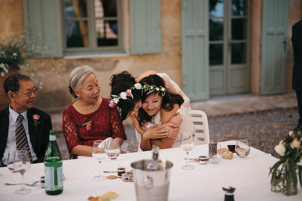 A first look and floral crown for an elegant and intimate chateau wedding in the South of France. Photography by Sabestien Boudot.