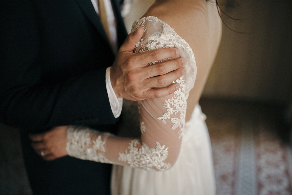 A first look and floral crown for an elegant and intimate chateau wedding in the South of France. Photography by Sabestien Boudot.