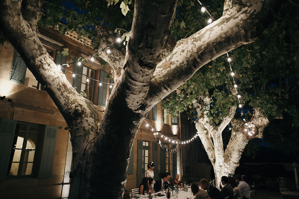 A first look and floral crown for an elegant and intimate chateau wedding in the South of France. Photography by Sabestien Boudot.