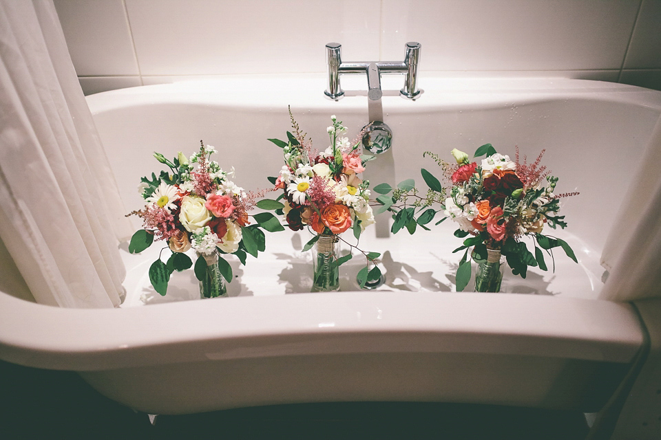 A Floral Gown and Pug Flowerdog for a Colourful and Vintage Inspired Black Tie Wedding, photography by Emma Boileau.