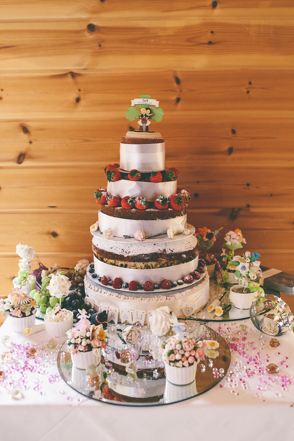 A Floral Gown and Pug Flowerdog for a Colourful and Vintage Inspired Black Tie Wedding, photography by Emma Boileau.