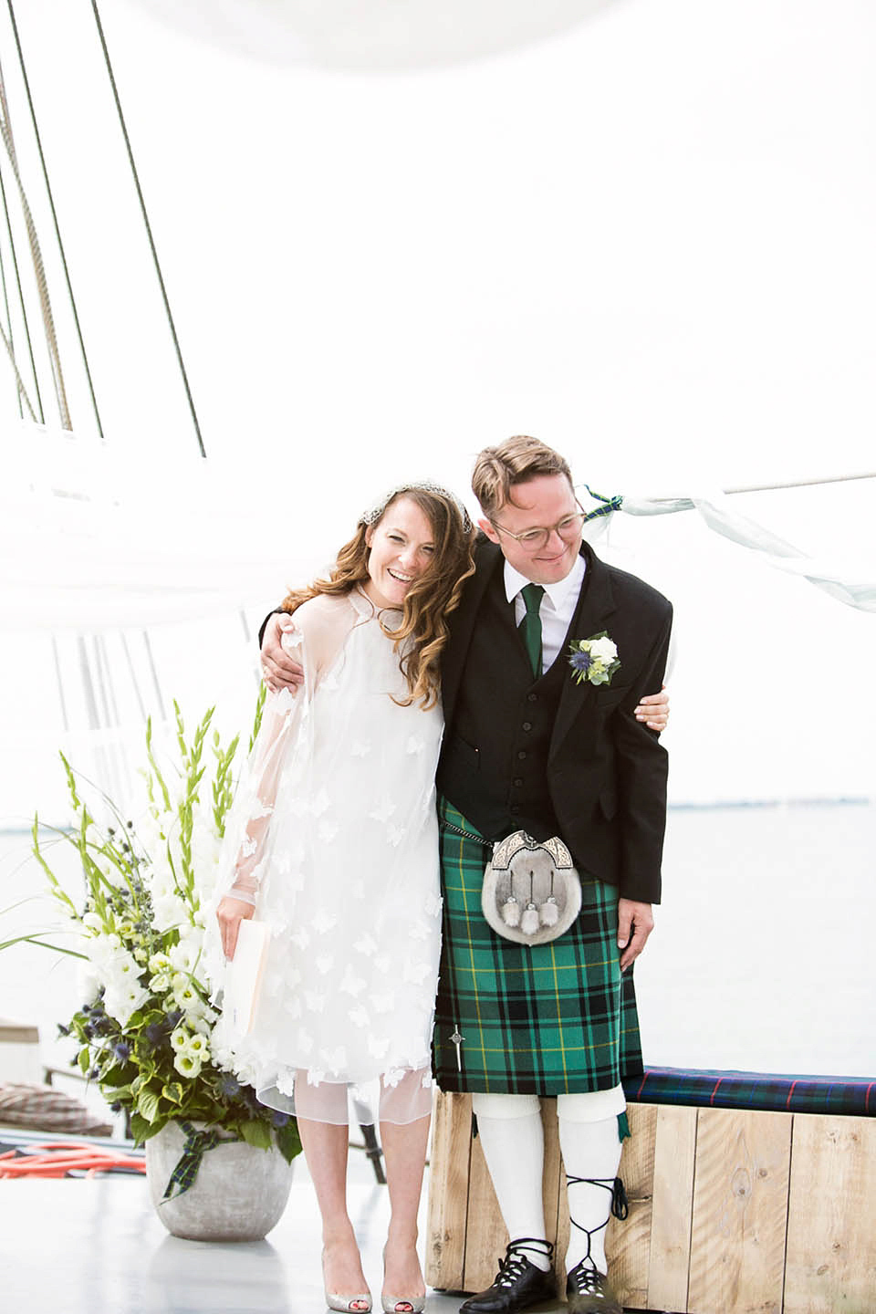 A Kaviar Gauche Butterfly Gown for a Boat Wedding in Amsterdam, photogrpahy by Taran Wilkhu.