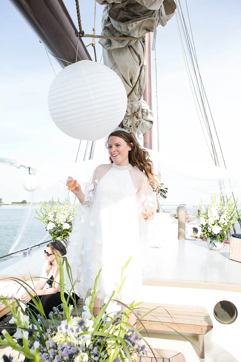 A Kaviar Gauche Butterfly Gown for a Boat Wedding in Amsterdam, photogrpahy by Taran Wilkhu.