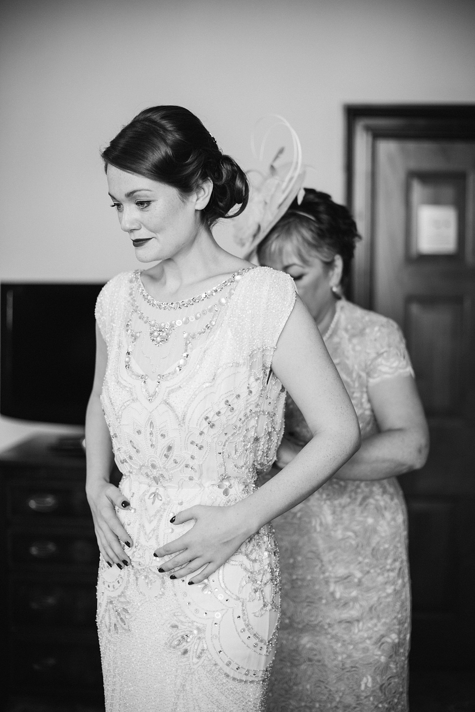 Bride Meg wears Eden by Jenny Packham for her 1920s and Great Gatsby inspired wedding at the Woodlands Hotel in Leeds. Photography by Cat Hepple.