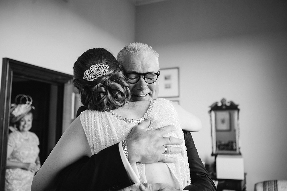 Bride Meg wears Eden by Jenny Packham for her 1920s and Great Gatsby inspired wedding at the Woodlands Hotel in Leeds. Photography by Cat Hepple.