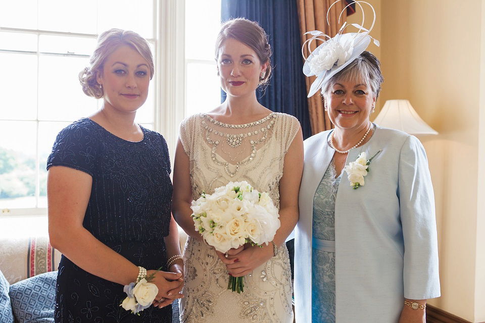 Bride Meg wears Eden by Jenny Packham for her 1920s and Great Gatsby inspired wedding at the Woodlands Hotel in Leeds. Photography by Cat Hepple.