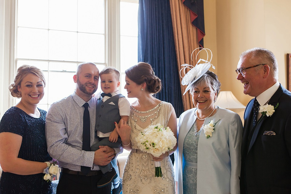 Bride Meg wears Eden by Jenny Packham for her 1920s and Great Gatsby inspired wedding at the Woodlands Hotel in Leeds. Photography by Cat Hepple.