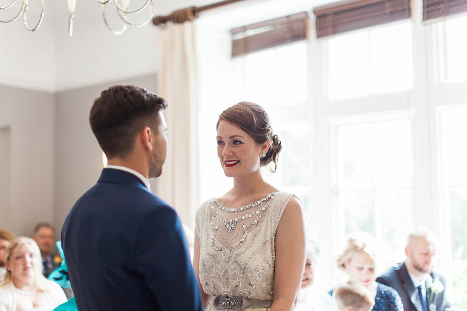 Bride Meg wears Eden by Jenny Packham for her 1920s and Great Gatsby inspired wedding at the Woodlands Hotel in Leeds. Photography by Cat Hepple.