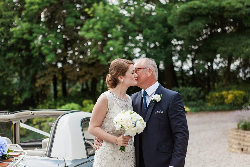 Bride Meg wears Eden by Jenny Packham for her 1920s and Great Gatsby inspired wedding at the Woodlands Hotel in Leeds. Photography by Cat Hepple.