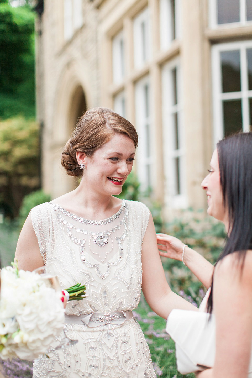 Bride Meg wears Eden by Jenny Packham for her 1920s and Great Gatsby inspired wedding at the Woodlands Hotel in Leeds. Photography by Cat Hepple.