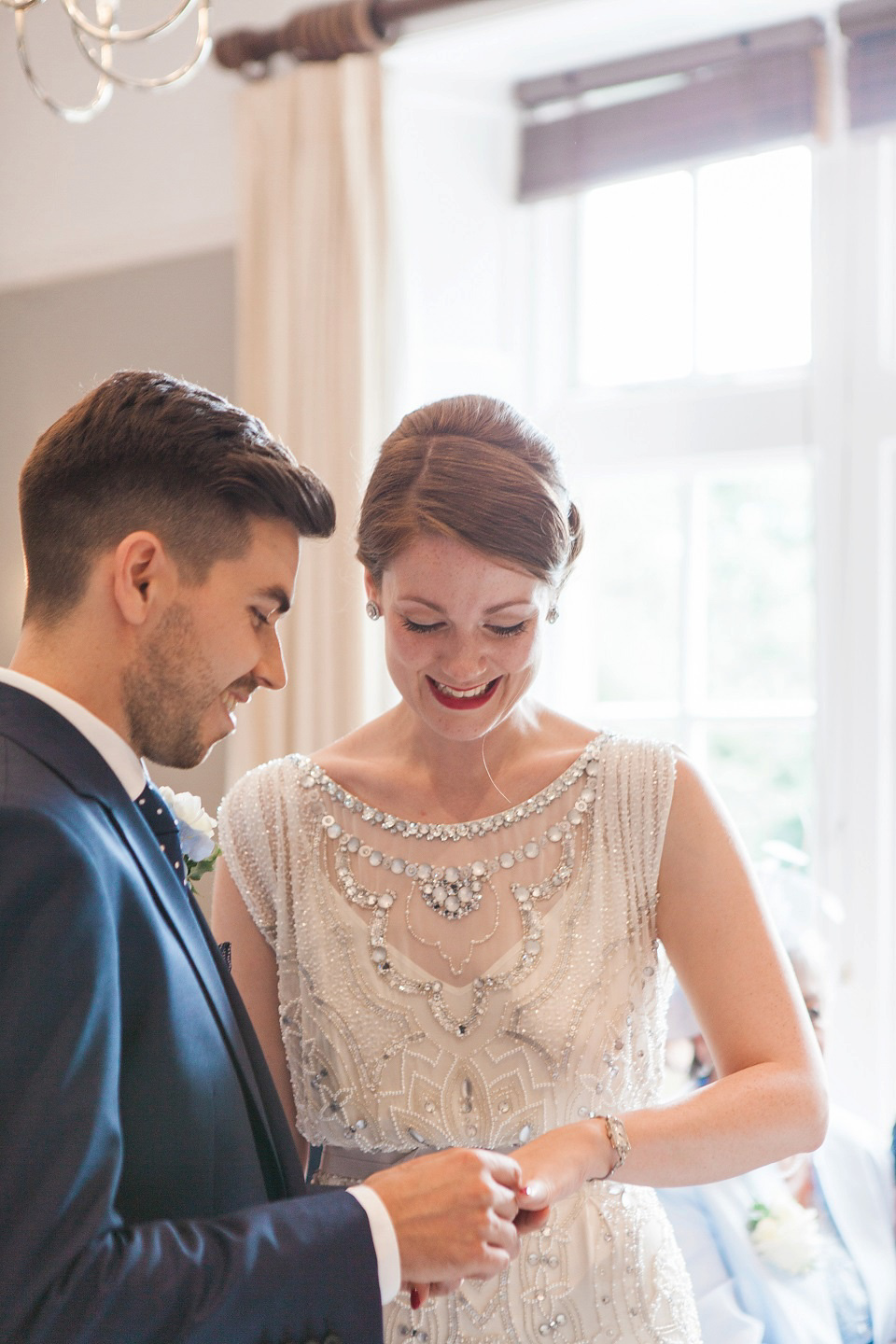 Bride Meg wears Eden by Jenny Packham for her 1920s and Great Gatsby inspired wedding at the Woodlands Hotel in Leeds. Photography by Cat Hepple.