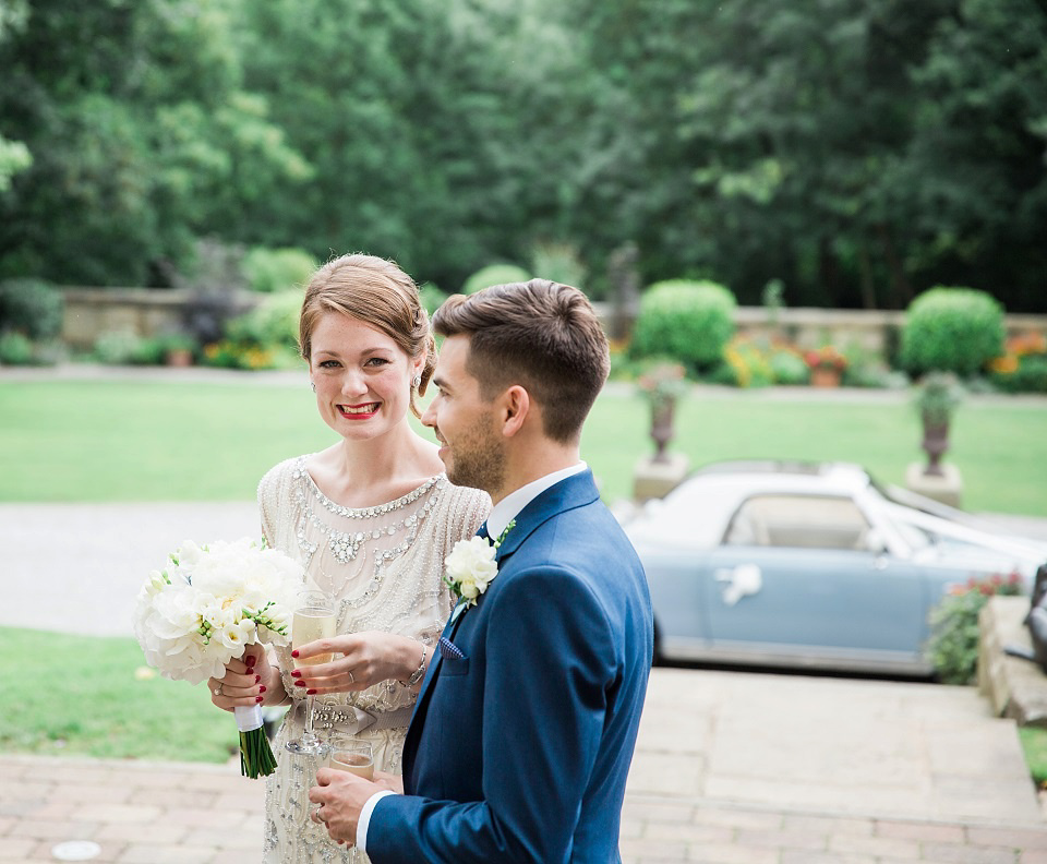 Bride Meg wears Eden by Jenny Packham for her 1920s and Great Gatsby inspired wedding at the Woodlands Hotel in Leeds. Photography by Cat Hepple.