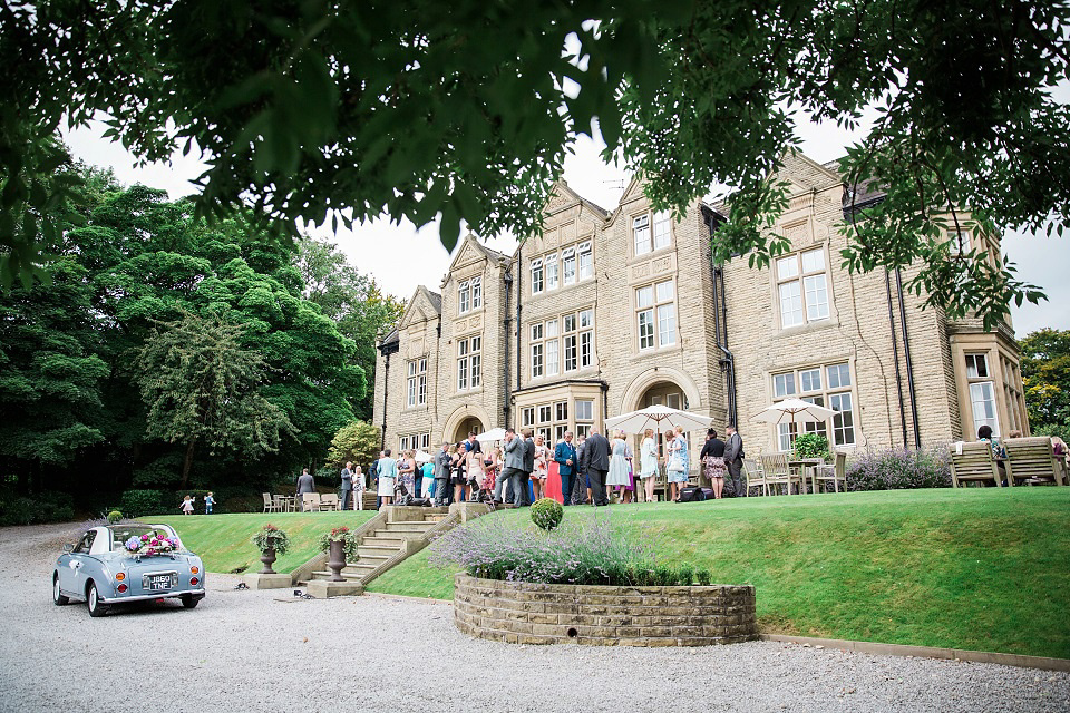 Bride Meg wears Eden by Jenny Packham for her 1920s and Great Gatsby inspired wedding at the Woodlands Hotel in Leeds. Photography by Cat Hepple.