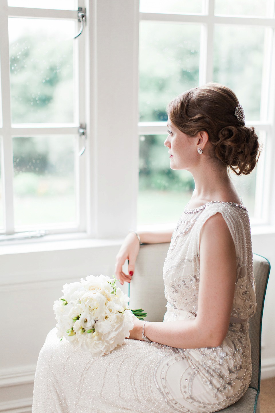 Bride Meg wears Eden by Jenny Packham for her 1920s and Great Gatsby inspired wedding at the Woodlands Hotel in Leeds. Photography by Cat Hepple.