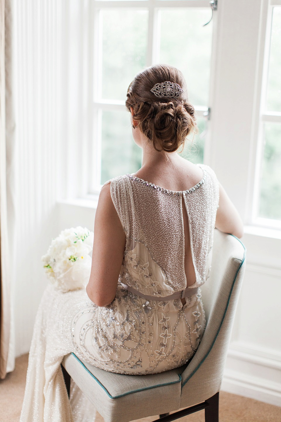 Bride Meg wears Eden by Jenny Packham for her 1920s and Great Gatsby inspired wedding at the Woodlands Hotel in Leeds. Photography by Cat Hepple.