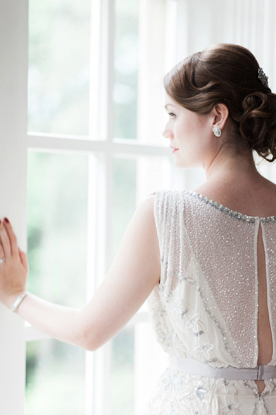 Bride Meg wears Eden by Jenny Packham for her 1920s and Great Gatsby inspired wedding at the Woodlands Hotel in Leeds. Photography by Cat Hepple.