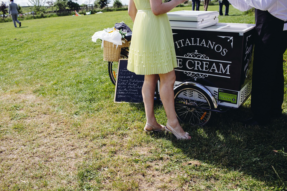 A 1970's Vintage Dress and a Floral Crown for a Book Inspired Farm Wedding. Photography by Lucy Little.