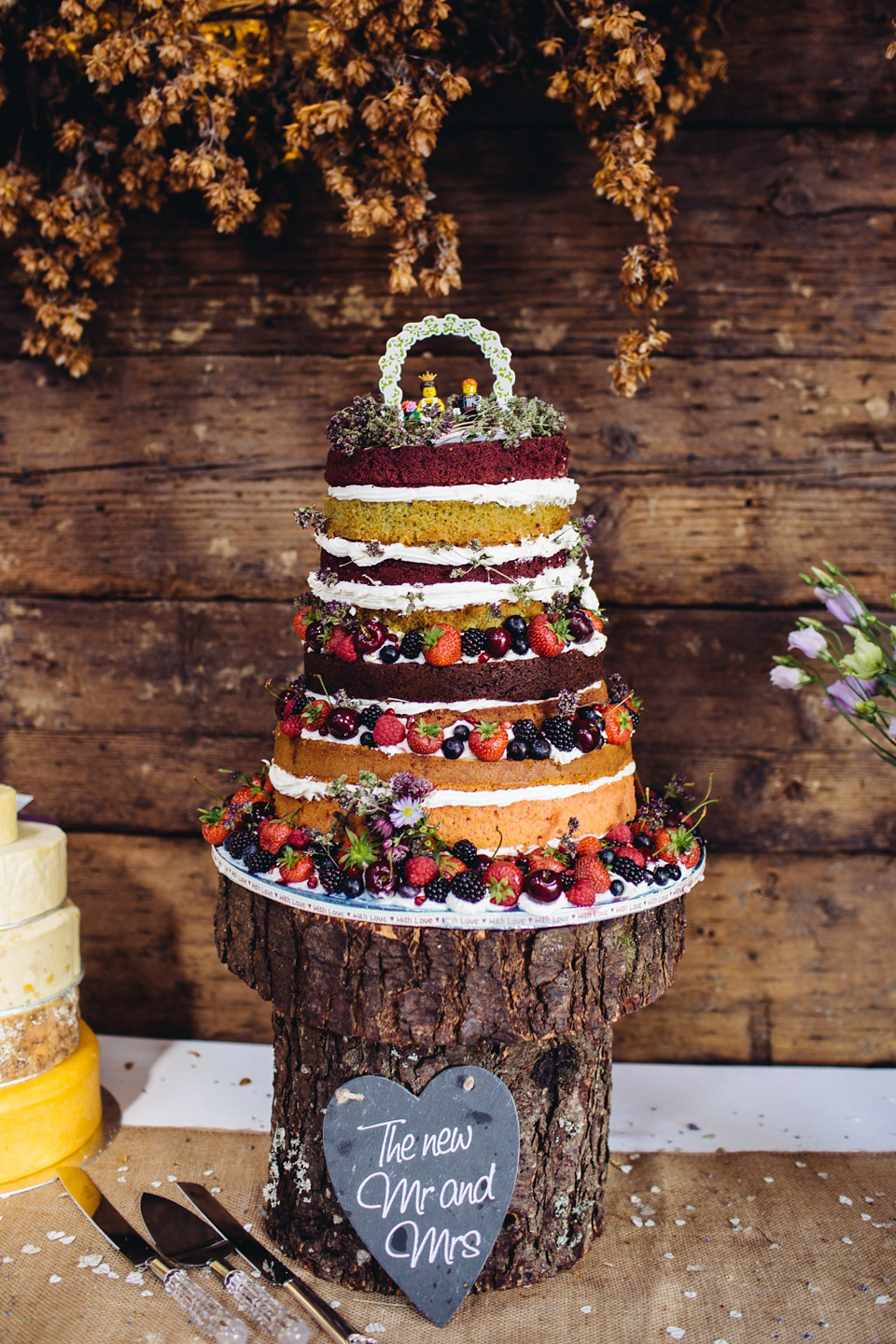 A 1970's Vintage Dress and a Floral Crown for a Book Inspired Farm Wedding. Photography by Lucy Little.