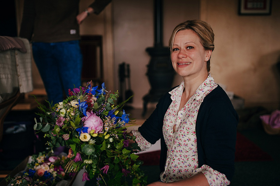 Tartan shoes and a Flowerdog for a Homemade Farm Wedding in Northumberland. Photography by Anna Urban.