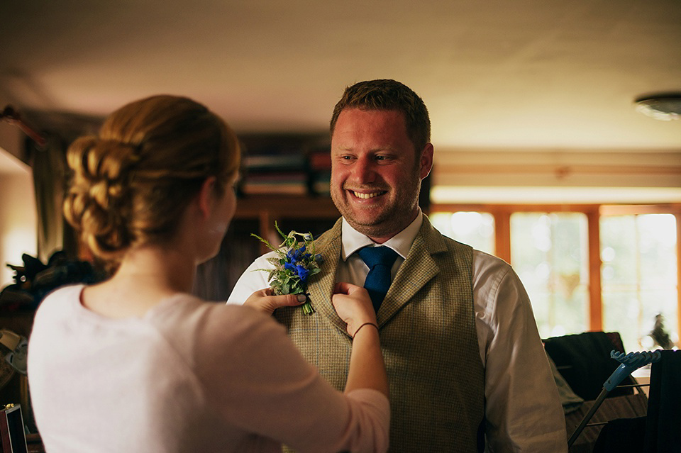 Tartan shoes and a Flowerdog for a Homemade Farm Wedding in Northumberland. Photography by Anna Urban.