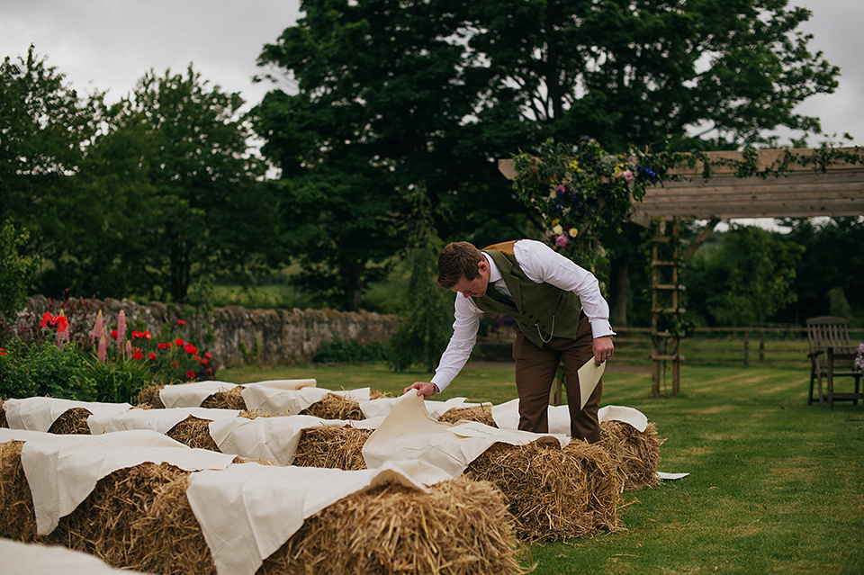 Tartan shoes and a Flowerdog for a Homemade Farm Wedding in Northumberland. Photography by Anna Urban.