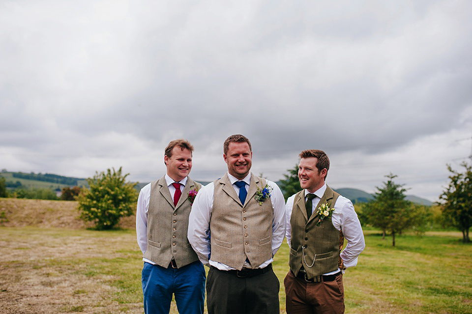 Tartan shoes and a Flowerdog for a Homemade Farm Wedding in Northumberland. Photography by Anna Urban.