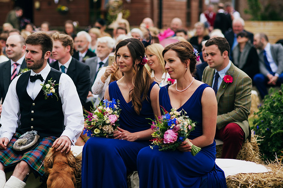 Tartan shoes and a Flowerdog for a Homemade Farm Wedding in Northumberland. Photography by Anna Urban.