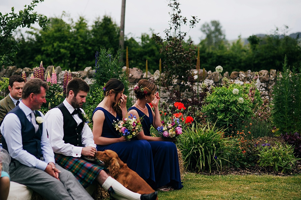 Tartan shoes and a Flowerdog for a Homemade Farm Wedding in Northumberland. Photography by Anna Urban.