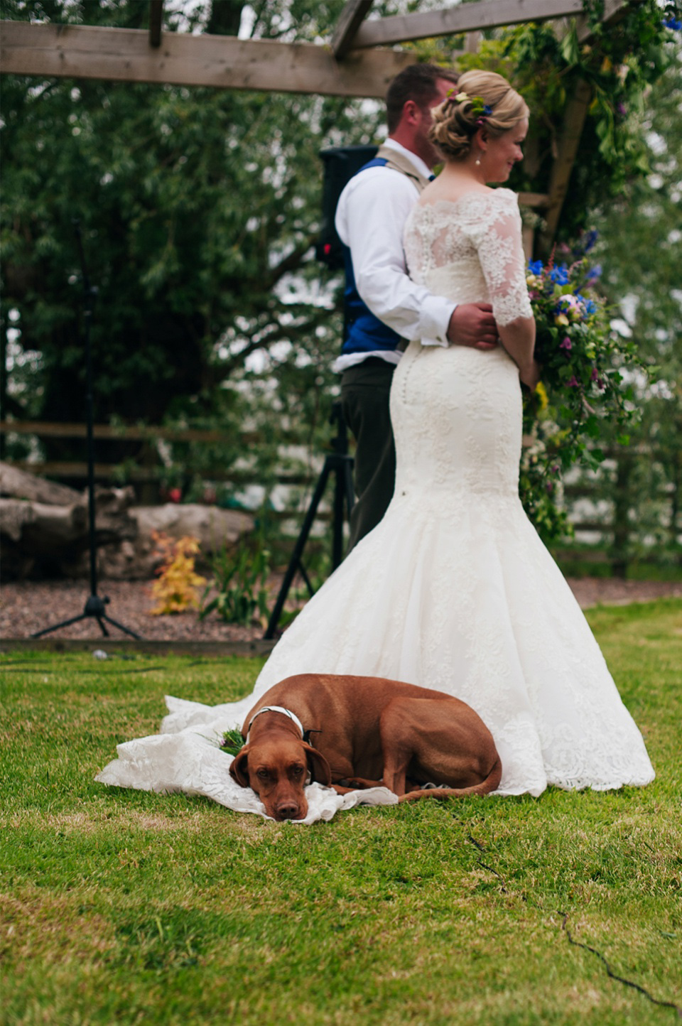 Tartan shoes and a Flowerdog for a Homemade Farm Wedding in Northumberland. Photography by Anna Urban.